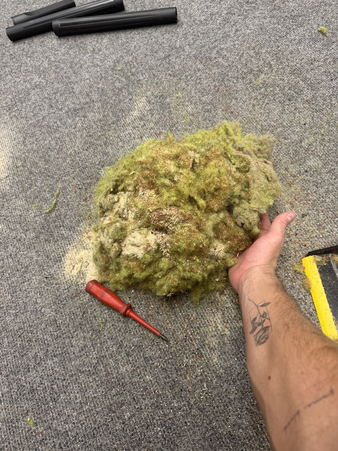 Ball fluff and debris removed from a padel court